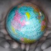 Globe in hands